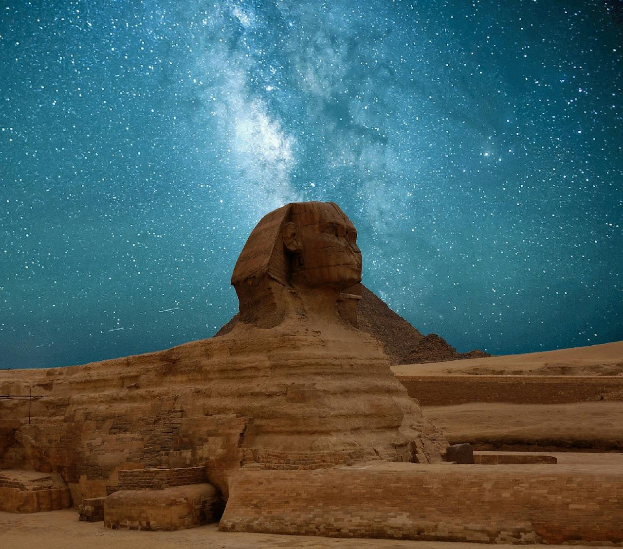 Home The Great Sphinx of Giza beneath a captivating Milky Way night sky.