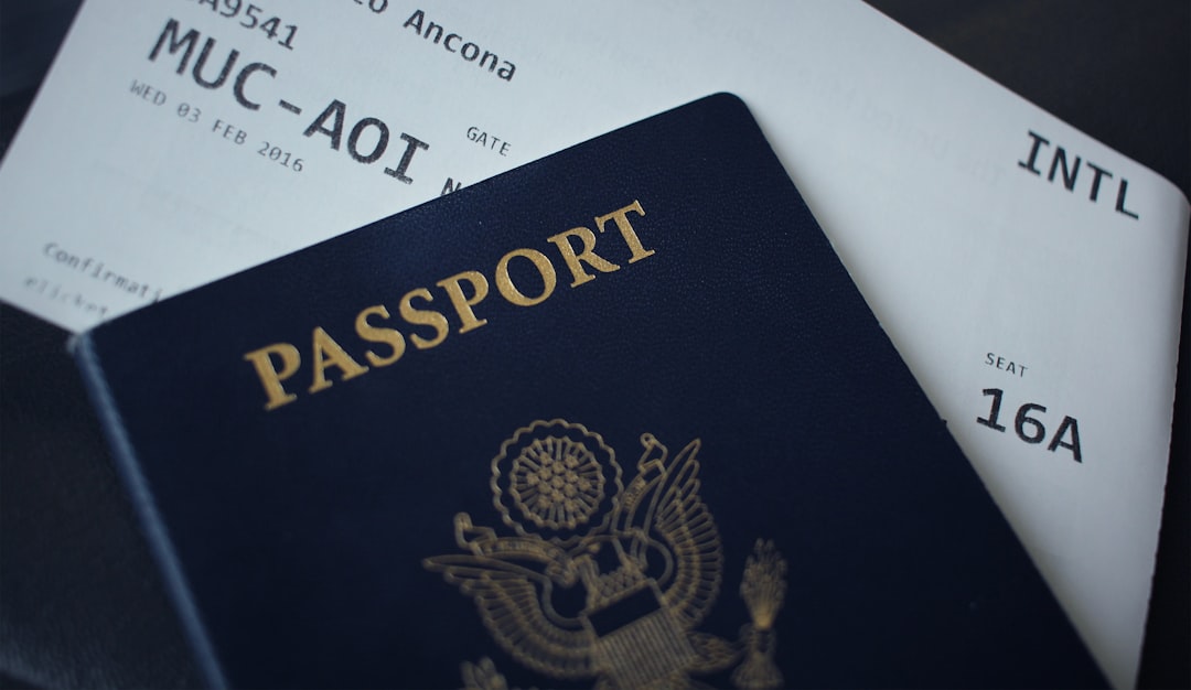 About passport-booklet-on-top-of-white-paper-gmj3tfolvna